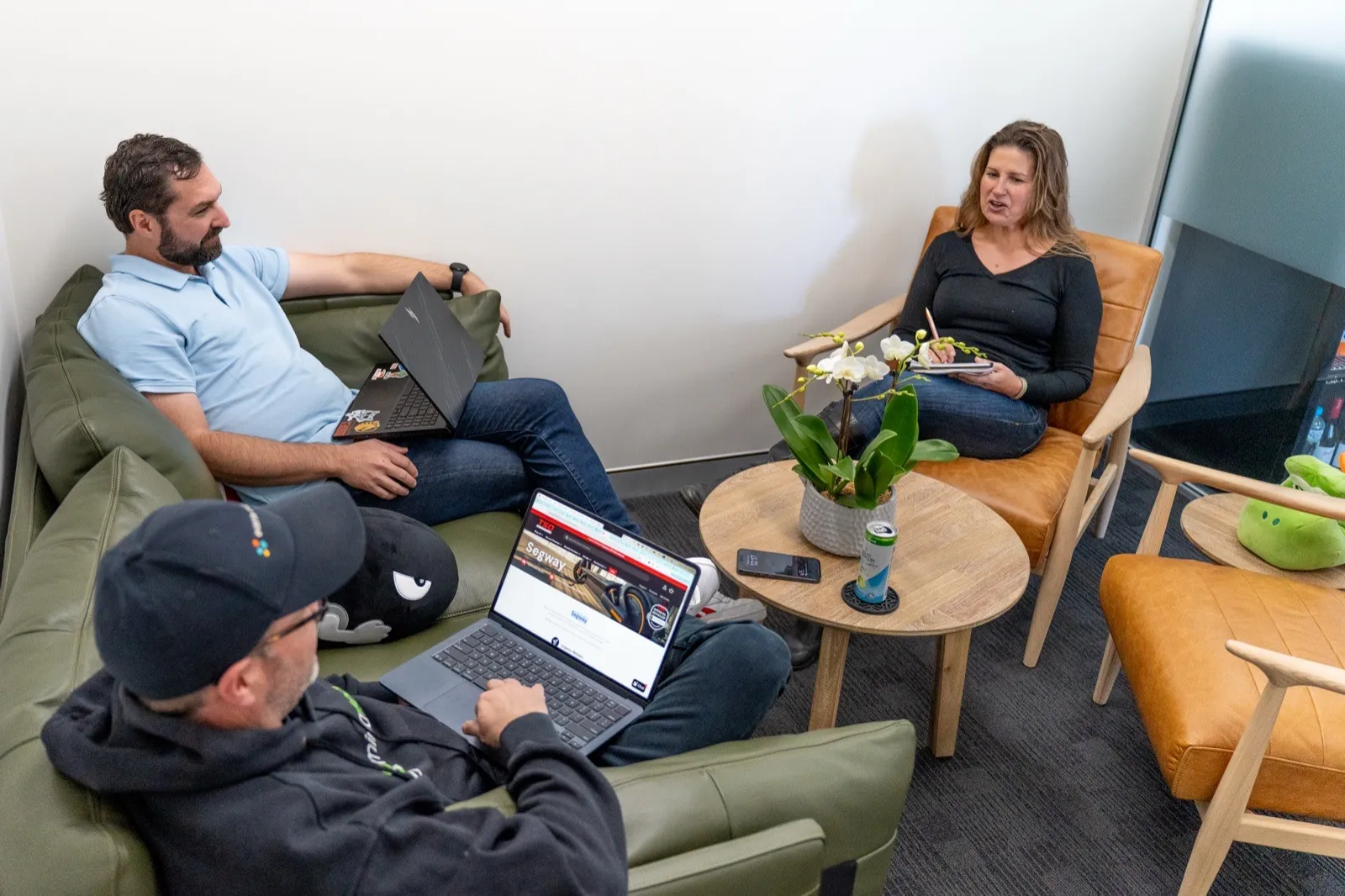 The Earned Media team collaborating in the office